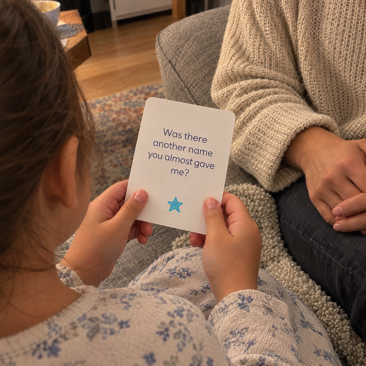Child reading an About Me card out loud to their parent