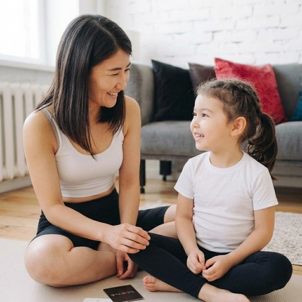 Parent and child smiling together after using Tell Me Cards to build emotional connection through conversation