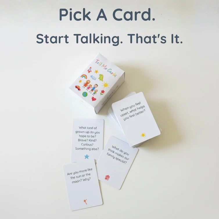 Four Tell Me Cards question cards and the Tell Me Cards box showing sample questions about emotions, family, values, and personality